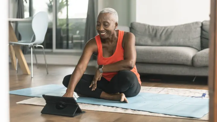 elderly woman doing yoga
